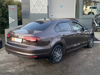 2016 Volkswagen Jetta VI Рестайлинг, коричневый, 840000 рублей, вид 3