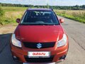 2010 Suzuki SX4 I (Classic) Рестайлинг, оранжевый - вид 1