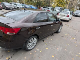 2011 Kia Cerato 6-speed II, пурпурный, 700000 рублей, вид 3