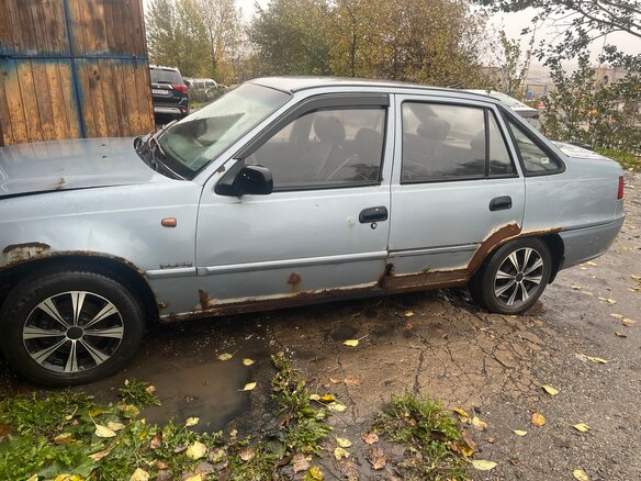 2012 Daewoo Nexia I Рестайлинг, серый - вид 3