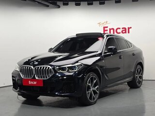 2023 BMW X6 30d III (G06), чёрный, 9584459 рублей, вид 1