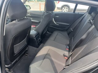 2018 BMW 1 серии 118i II (F20/F21) Рестайлинг 2, чёрный, 1900000 рублей, вид 5
