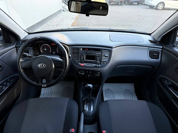 2010 Kia Rio II Рестайлинг, серебристый - вид 11