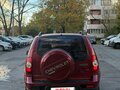 2011 Chevrolet Niva I Рестайлинг, красный - вид 3