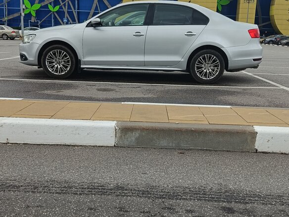 2011 Volkswagen Jetta VI, серебристый - вид 5