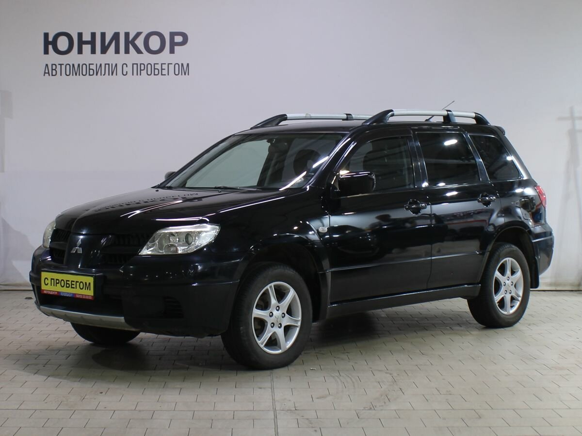 Открыть фотографии: Mitsubishi Outlander I