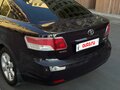 2009 Toyota Avensis III, фиолетовый, 1250000 рублей - вид 8
