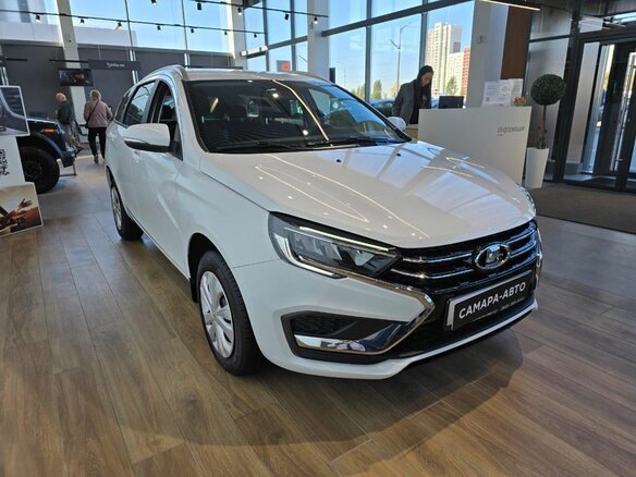 2026 Lada (ВАЗ) Vesta SW I Рестайлинг (NG), белый, 1815000 рублей - вид 2