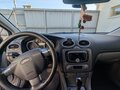 2009 Ford Focus II Рестайлинг, серебристый, 675000 рублей - вид 4