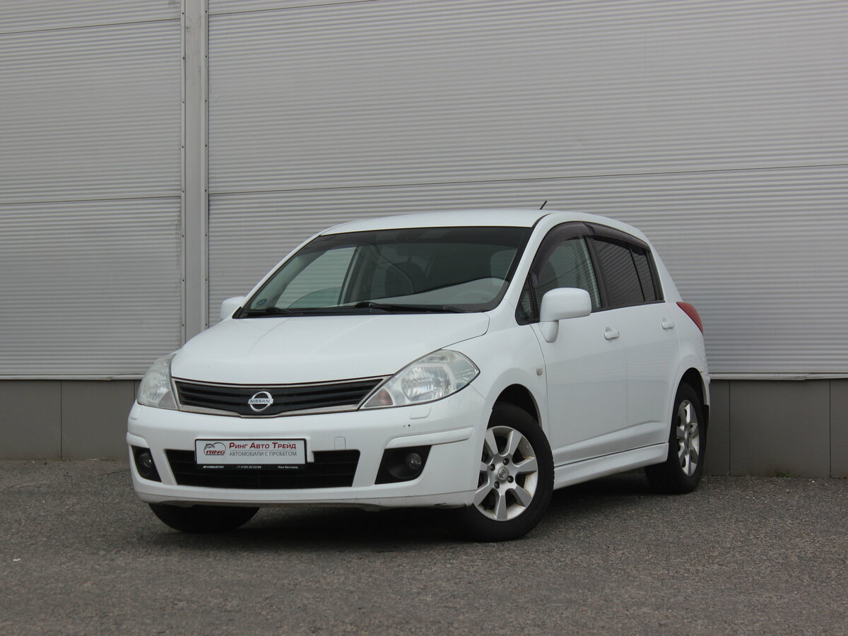 Открыть фотографии: Nissan Tiida I Рестайлинг