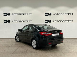 2012 Kia Rio 5-speed III, чёрный, 699000 рублей, вид 4