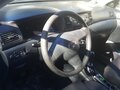 2005 Toyota Corolla IX (E120, E130) Рестайлинг, серый, 450000 рублей - вид 5