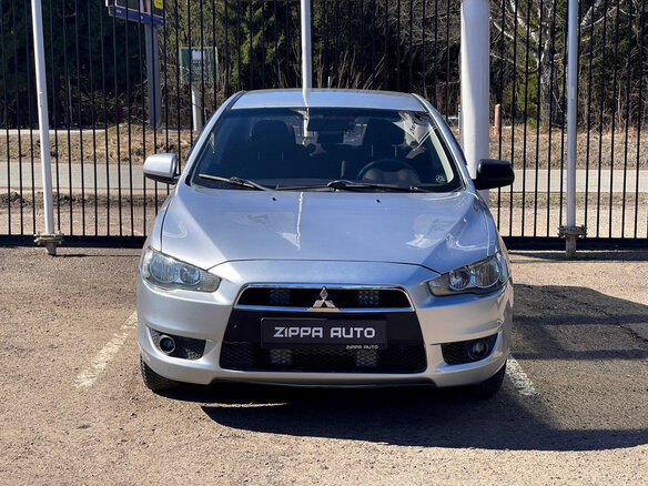 2011 Mitsubishi Lancer X Рестайлинг, серебристый, 629000 рублей - вид 2