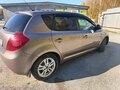2009 Kia Ceed I, бежевый - вид 1