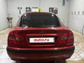 1999 Mitsubishi Carisma I Рестайлинг, пурпурный - вид 3