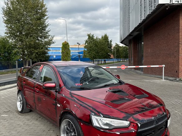 2008 Mitsubishi Lancer X, красный, 880000 рублей - вид 3
