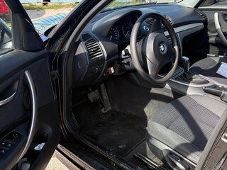 2010 BMW 1 серии 116i I (E81/E82/E87/E88) Рестайлинг, чёрный, 720000 рублей, вид 4