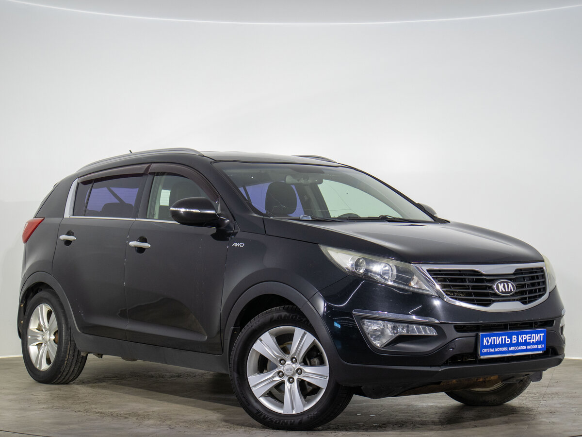 Открыть фотографии: Kia Sportage III