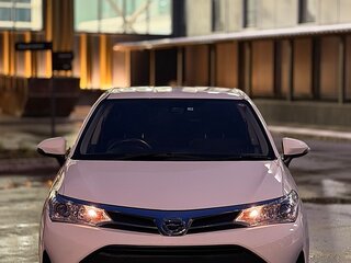 2019 Toyota Corolla Axio XI (E160, E170) Рестайлинг 2, белый, 1450000 рублей, вид 2