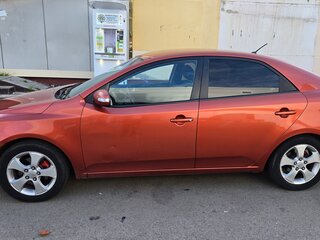 2010 Kia Cerato 4-speed II, оранжевый, 750000 рублей, вид 4