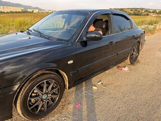 2007 Hyundai Sonata ТагАЗ IV (EF) Рестайлинг, чёрный, 250000 рублей, вид 3
