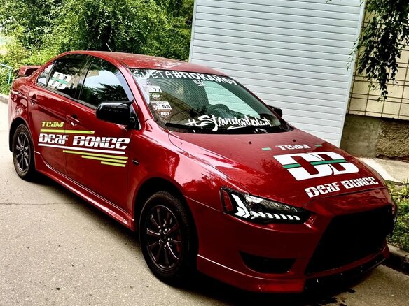 2010 Mitsubishi Lancer X, красный, 1399999 рублей - вид 19