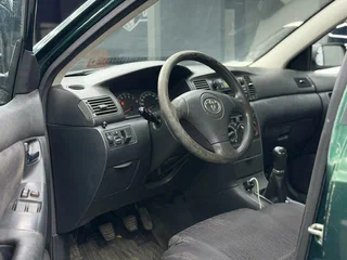 2002 Toyota Corolla IX (E120, E130), зелёный, 261000 рублей, вид 5