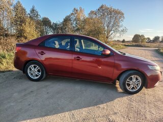2011 Kia Cerato 6-speed II, красный, 860000 рублей, вид 2