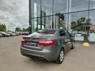 2014 Kia Rio 6-speed III, серый, 754000 рублей, вид 5