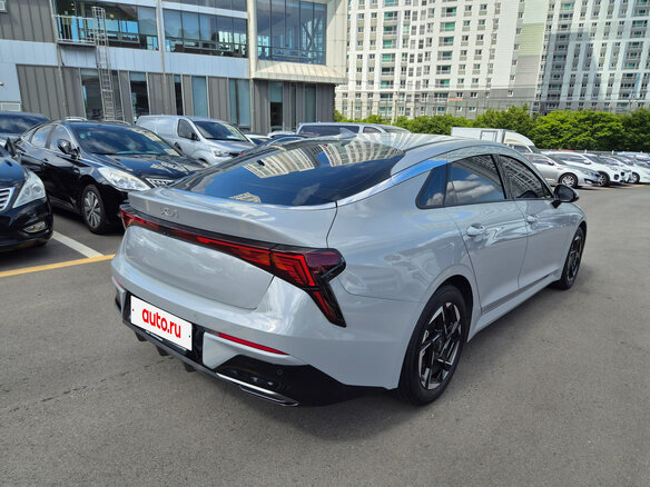 2023 Kia K5 LPi III Рестайлинг, серый - вид 4