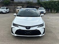 2023 Toyota Corolla Sporty XII (E210) Рестайлинг, белый, 1750000 рублей - вид 1