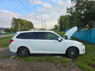 2014 Toyota Corolla Fielder XI (E160, E170, E180), белый, 1150000 рублей, вид 4