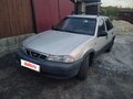 2007 Daewoo Nexia I, серебристый, 100000 рублей