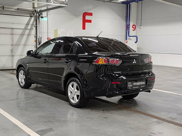 2010 Mitsubishi Lancer X, чёрный - вид 6