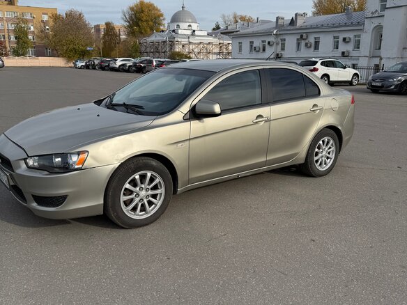 2009 Mitsubishi Lancer X, бежевый, 395000 рублей - вид 6