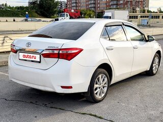 2013 Toyota Corolla XI (E160, E170, E180), белый, 990000 рублей, вид 5