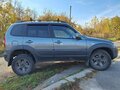 2018 Chevrolet Niva I Рестайлинг, серый, 800000 рублей - вид 1