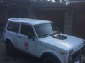 1999 Lada (ВАЗ) 2121 (4x4) I Рестайлинг, белый, 140000 рублей - вид 4