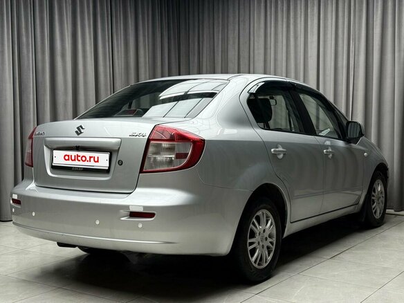 2010 Suzuki SX4 I (Classic) Рестайлинг, серебристый, 744000 рублей - вид 4
