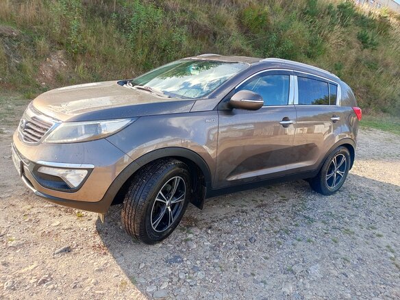 2012 Kia Sportage III, коричневый, 950000 рублей - вид 4