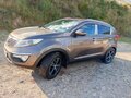 2012 Kia Sportage III, коричневый, 950000 рублей - вид 4