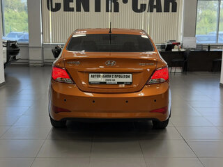 2015 Hyundai Solaris I Рестайлинг, оранжевый, 895000 рублей, вид 4