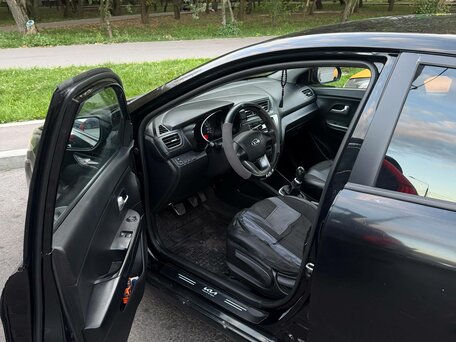 2012 Kia Rio III, чёрный, вид 4
