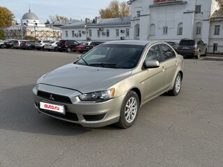 2009 Mitsubishi Lancer X, бежевый, 395000 рублей, вид 2