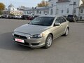 2009 Mitsubishi Lancer X, бежевый, 395000 рублей - вид 1