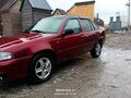 2012 Daewoo Nexia I Рестайлинг, пурпурный, 140000 рублей - вид 2