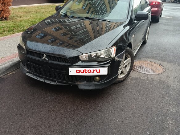 2007 Mitsubishi Lancer X, чёрный - вид 1