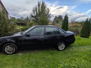 2009 Daewoo Nexia I Рестайлинг, чёрный, 190000 рублей, вид 5