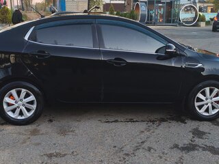 2016 Kia Rio III Рестайлинг, чёрный, 1170000 рублей, вид 4