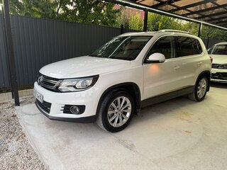 2011 Volkswagen Tiguan I Рестайлинг, белый, 1350000 рублей, вид 1
